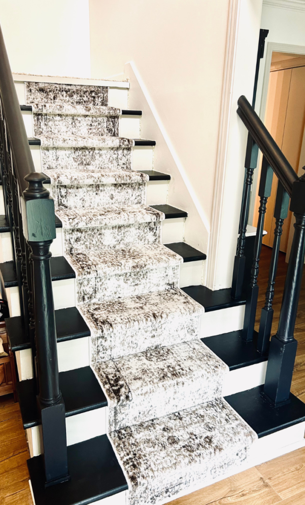 carpet runner on painted staircase