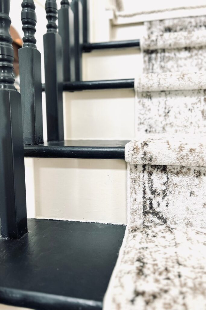 carpet runner on painted staircase