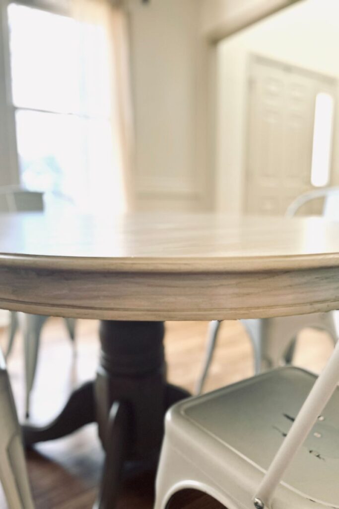 up-close of oak dining table paint wash transformation