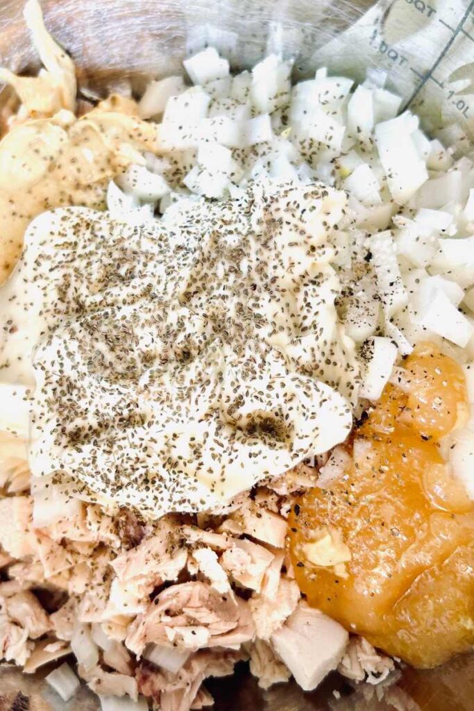 chicken salad ingredients in bowl