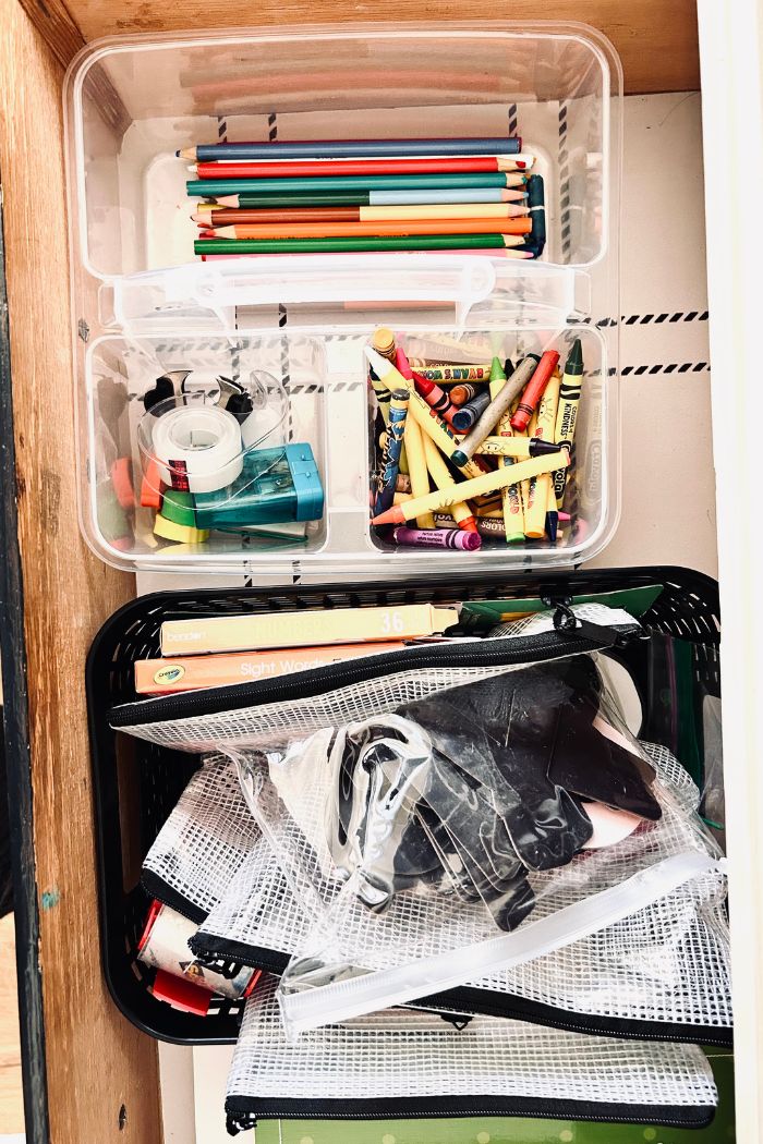 homeschool supplies organized in drawer