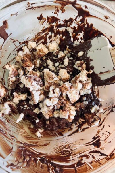 chopped nuts in melted chocolate