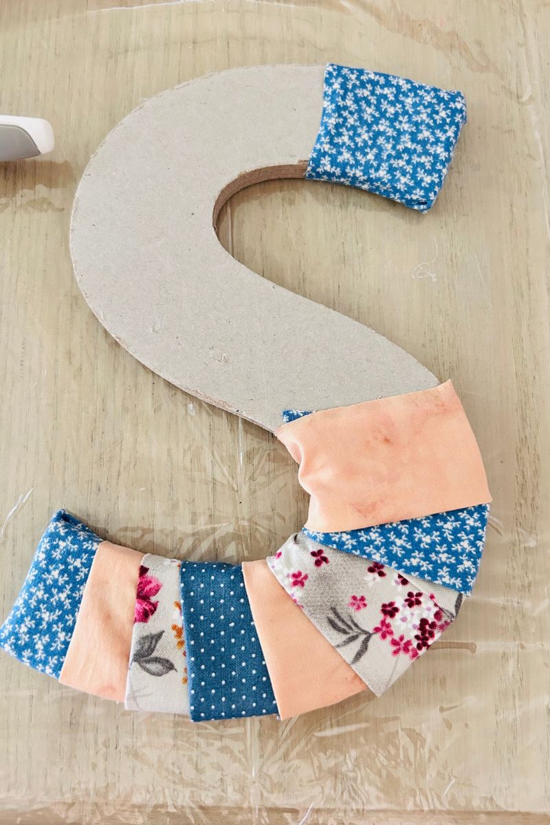 fabric glued to letter