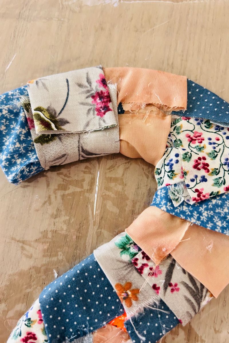 backside of fabric glued to letter